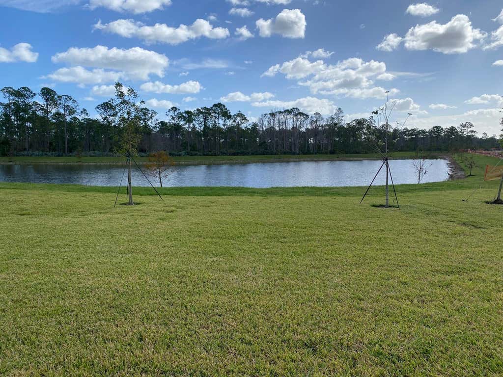 Photo of 6761 SE Park Trace Drive, Stuart, FL 34997 (MLS # R11037007)