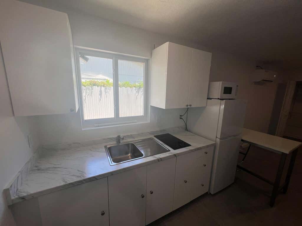 Photo of 1244 W 27TH Street #B, Riviera Beach, FL 33404 (MLS # B26056942)