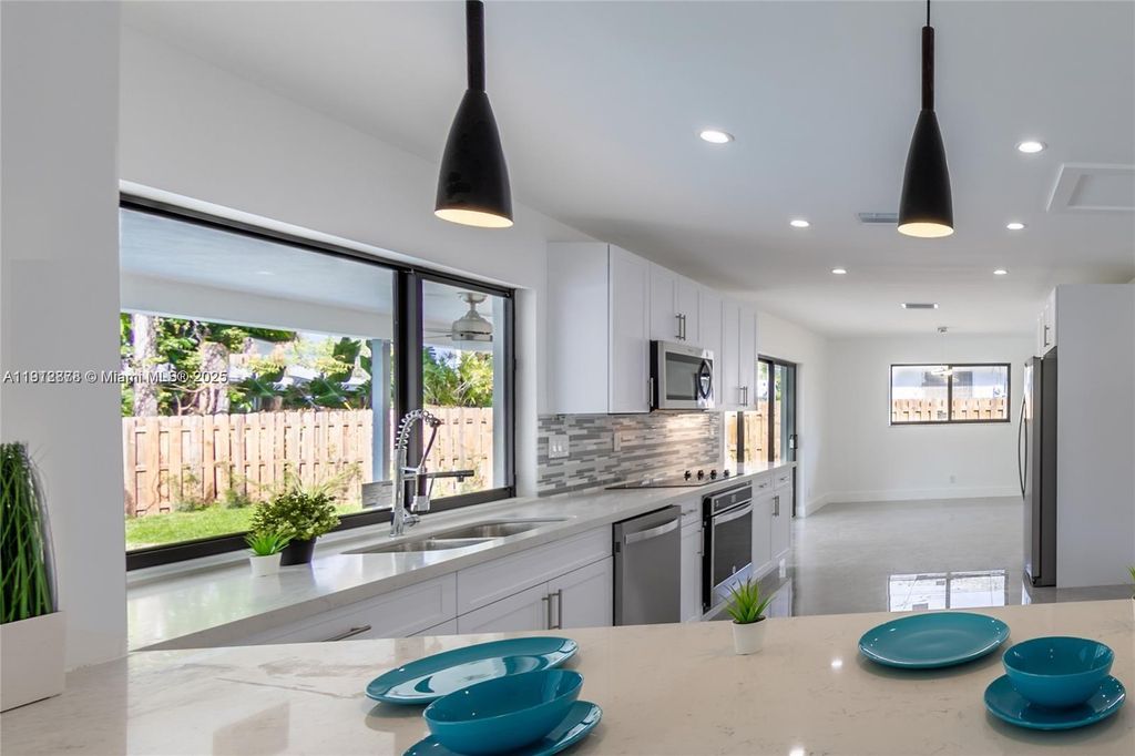 Photo of 1001 NW 6th Drive, Boca Raton, FL 33486 (MLS # R11147309)