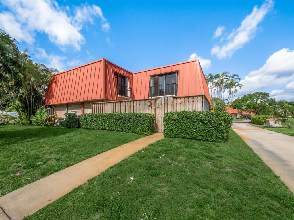 Photo of 3195 N Meridian Way N #D, Palm Beach Gardens, FL 33410 (MLS # R10712476)