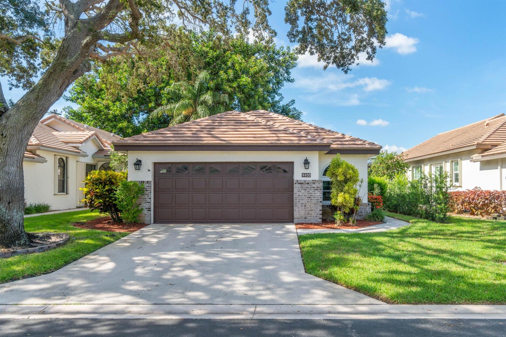 Photo of 4400 Sherwood Forest Drive, Delray Beach, FL 33445 (MLS # R10908989)