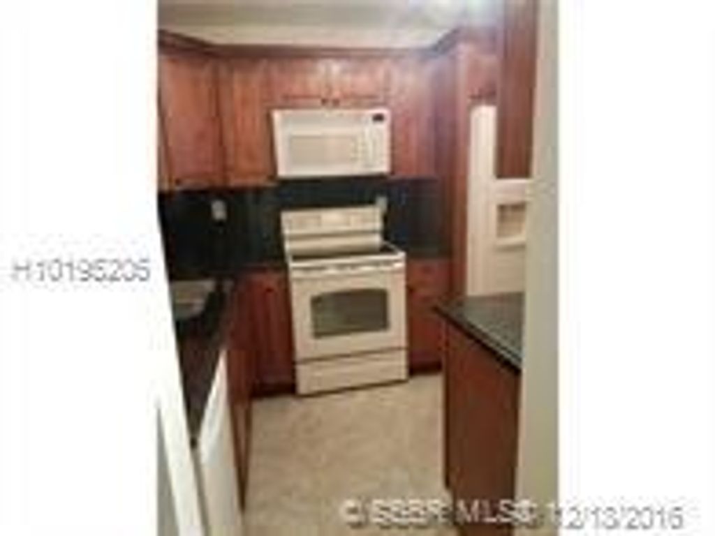 Photo of 3011 Riverside Dr #117, Coral Springs, FL 33065 (MLS # F10324457)