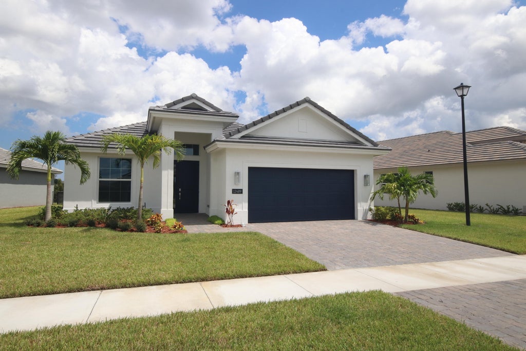 Photo of 12489 SW Sunrise Lake Terrace, Port Saint Lucie, FL 34987 (MLS # R10919921)
