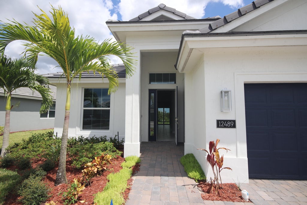 Photo of 12489 SW Sunrise Lake Terrace, Port Saint Lucie, FL 34987 (MLS # R10919921)