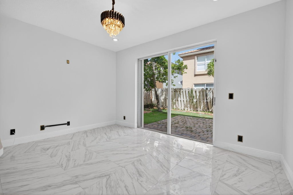 Photo of 4083 LAKE TAHOE Circle, West Palm Beach, FL 33409 (MLS # B26084529)