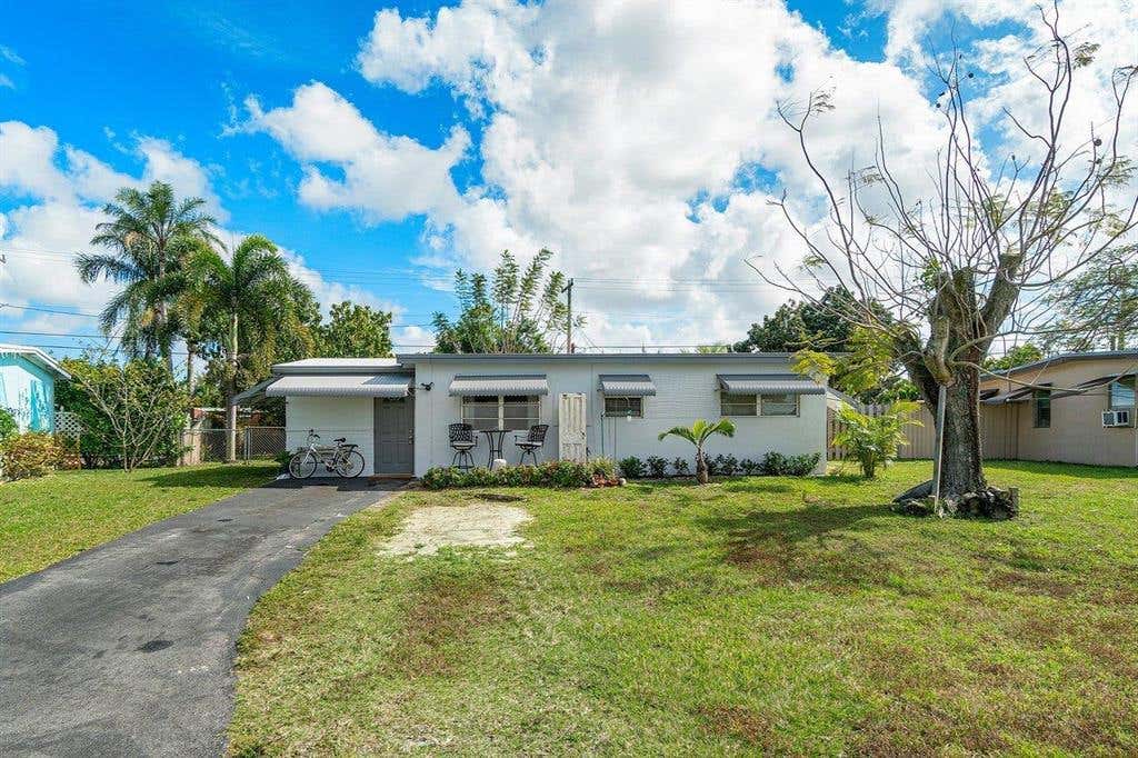 Photo of 5564 Maypop Road #Rd, West Palm Beach, FL 33415 (MLS # R10692376)
