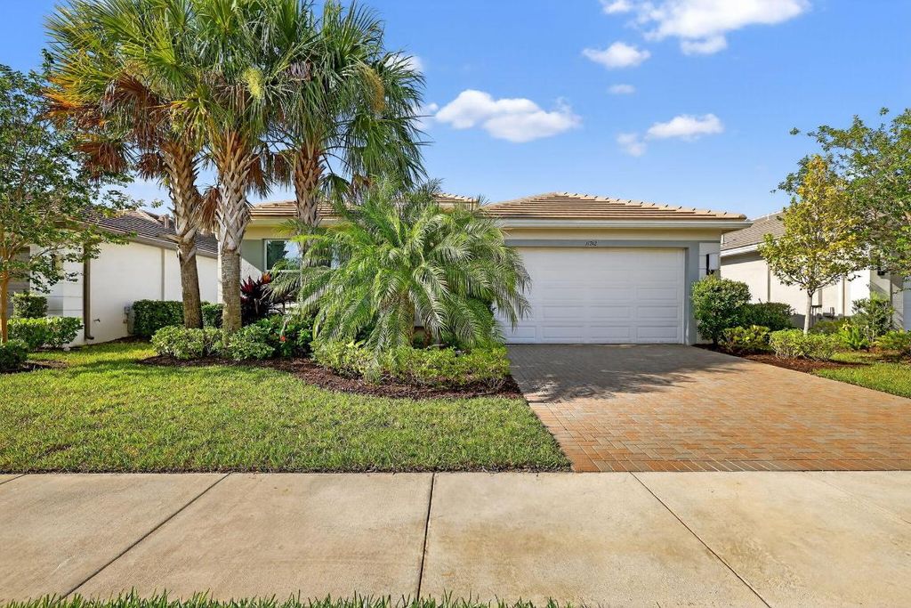 Photo of 11742 SW Sailfish Isles Way, Port Saint Lucie, FL 34987 (MLS # R11106380)