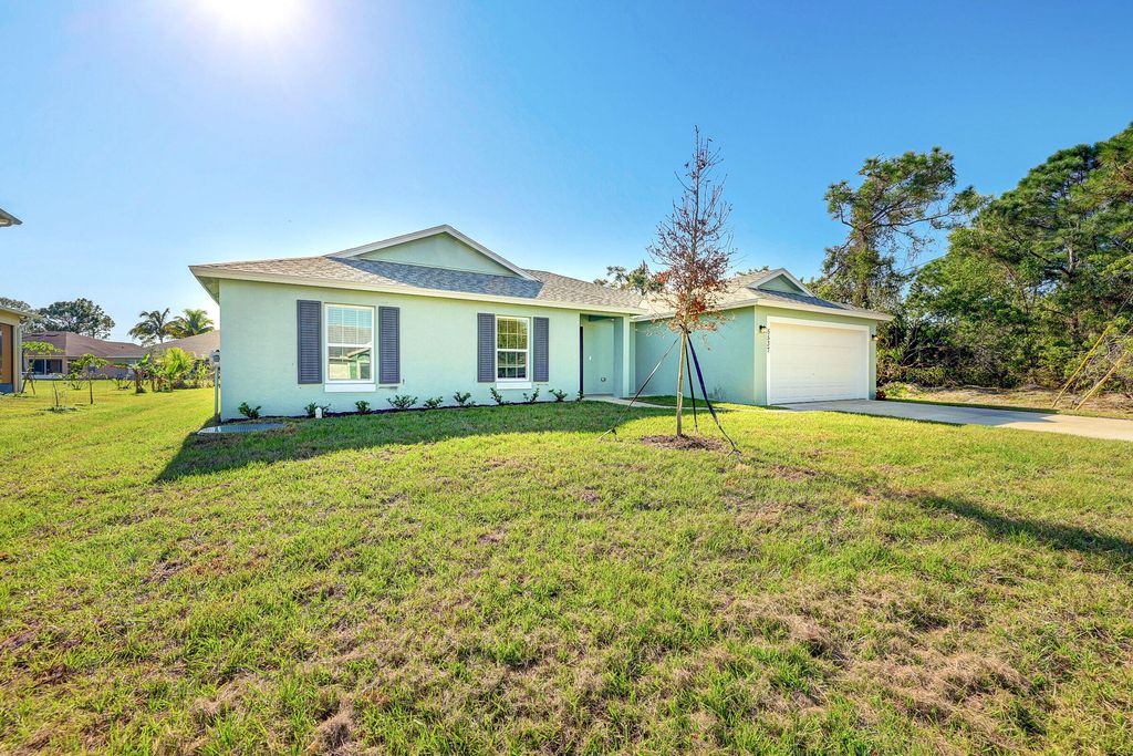 Photo of 202 SW Aldoro Place, Port Saint Lucie, FL 34953 (MLS # R10958462)