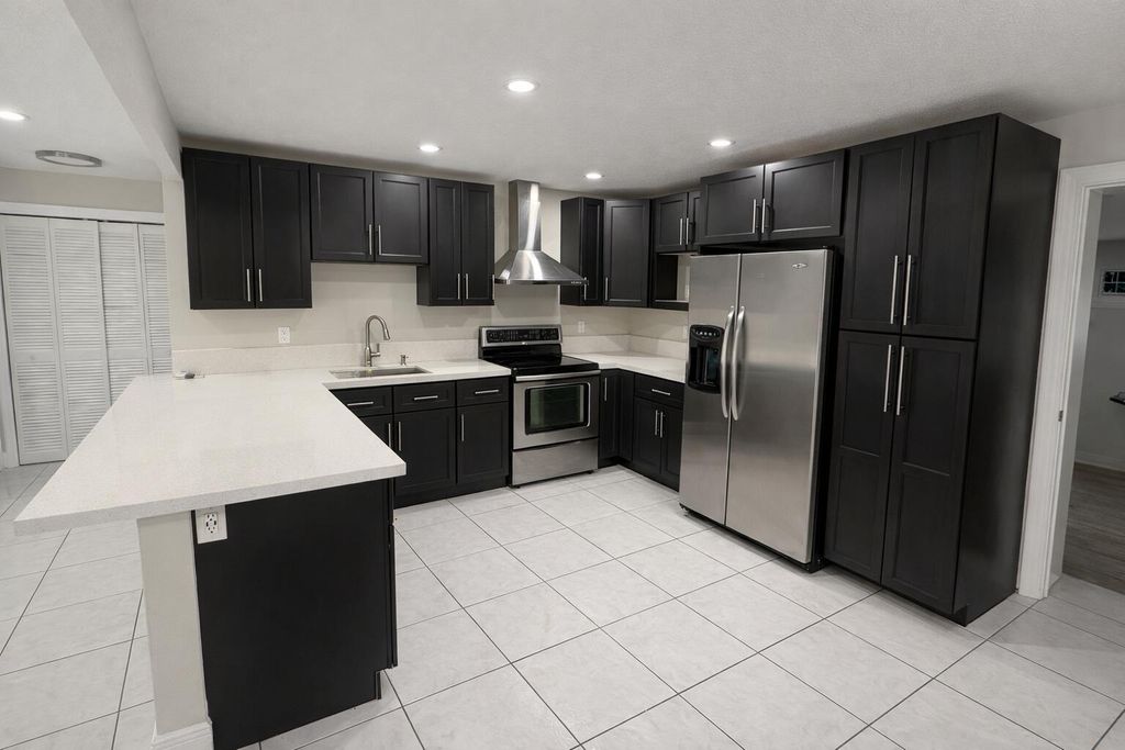 Photo of 2800 SW 9th Street, Fort Lauderdale, FL 33312 (MLS # B26013089)