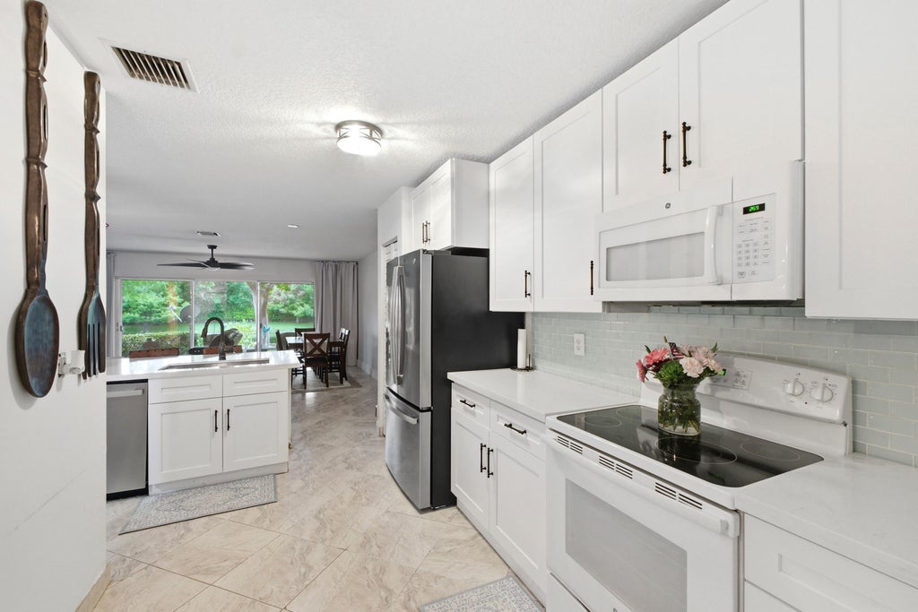 Photo of 10158 Royal Palm Boulevard #505-5, Coral Springs, FL 33065 (MLS # B26048659)
