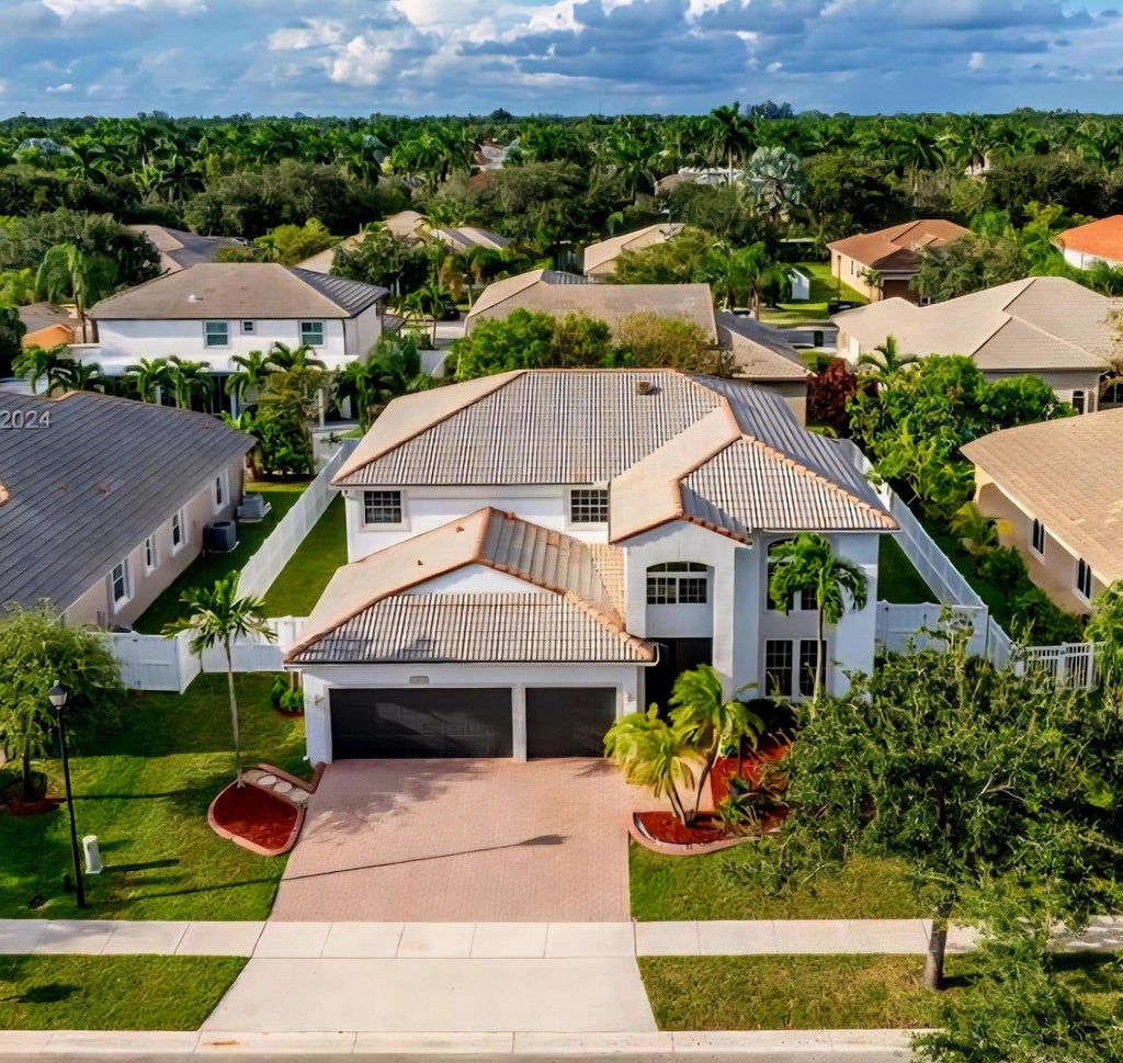 Photo of 13823 NW 15th Street NW, Pembroke Pines, FL 33028 (MLS # B26073688)