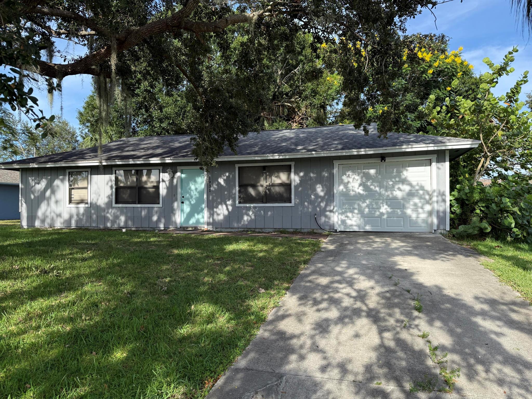 This charming space offers comfort, convenience, and character. Enjoy a spacious covered back patio overlooking a lush, tropical backyard -- perfect for relaxing or entertaining. Inside, you'll find an open and functional layout with luxury plank floors and plenty of natural light. Ideally located near I-95, the Turnpike, Crosstown Parkway, shopping, and great restaurants. Only 5 minutes away from Oak Hammock K-8 School. A wonderful place to call home!