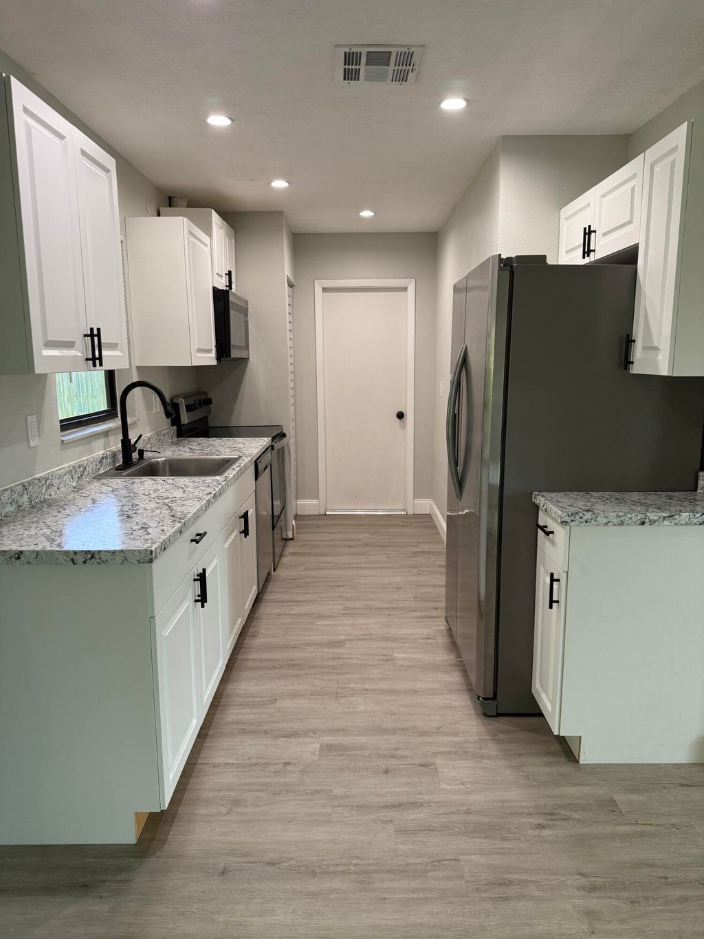 Photo of 1931 SW Beekman Street, Port Saint Lucie, FL 34953 (MLS # R11114436)