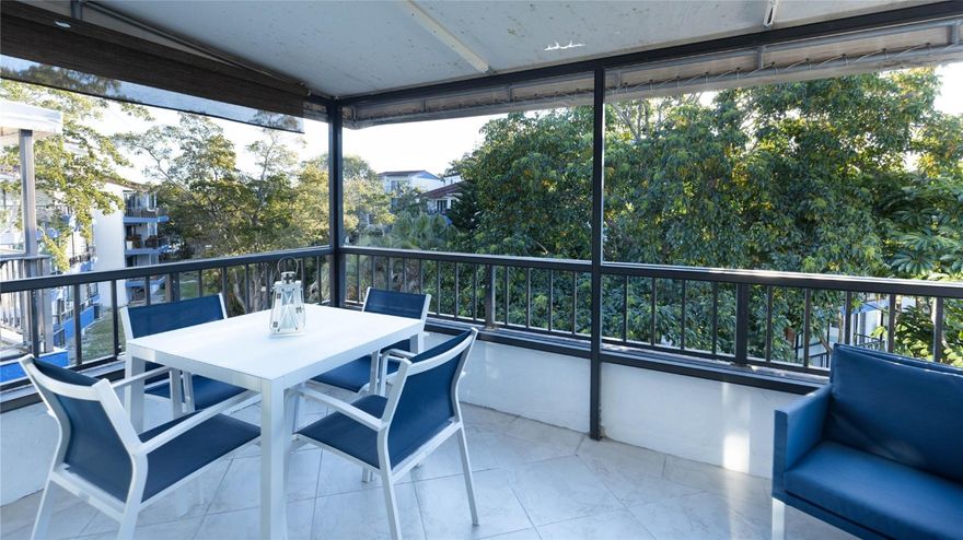 Enjoying enhanced privacy, serenity, and abundant natural light at the highest level of the building, this 2 bedroom, 2 bathroom condo offers a refined and calming living experience with beautiful garden and golf views. Features two custom built-in Murphy beds with ample storage, tile flooring throughout, ceiling fans, and a functional kitchen with island. Rare double interior garage located on site included, offering exceptional convenience and added value. Situated in a well-maintained community with planned golf course and site improvements enhancing lifestyle and long-term value. A true gem combining comfort and understated elegance.