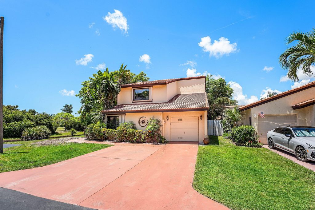 Photo of 2810 Sand Pines Court, Lake Worth, FL 33462 (MLS # B26033137)