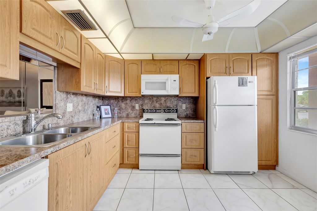 Photo of 2004 Granada Dr #D1, Coconut Creek, FL 33066 (MLS # F10393649)