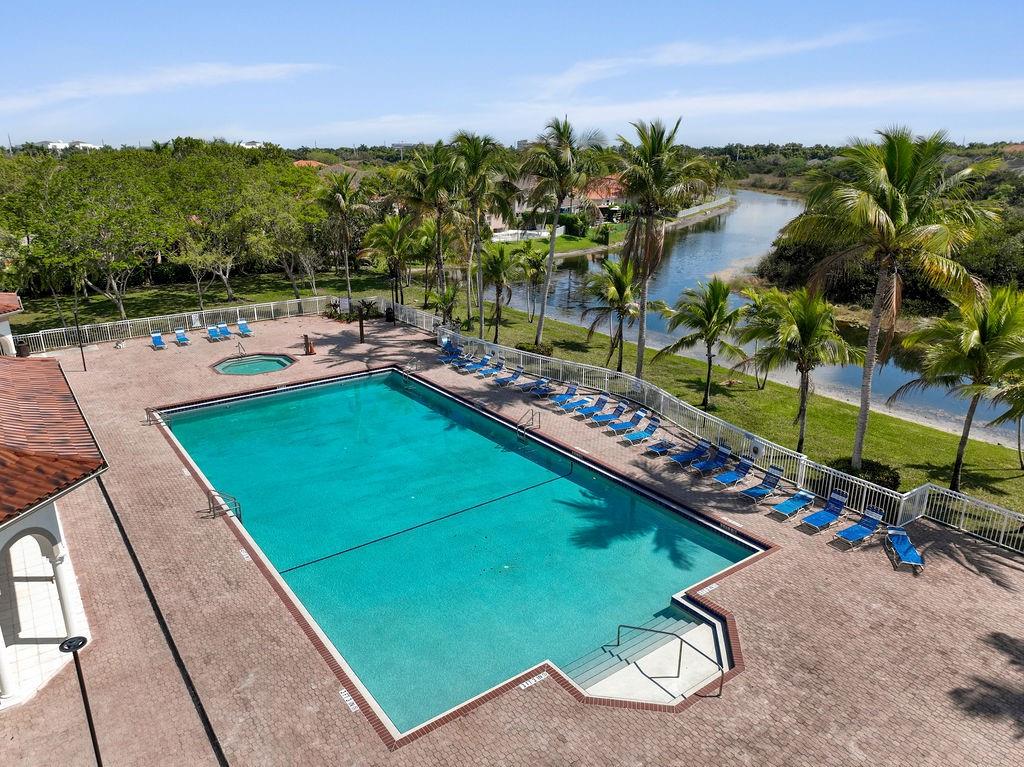 Stunning 3-bedroom, 2.5-bathroom townhome located in the gated community of Nautica. This home features stylish vinyl and tile floors, a spacious living room, dining room, and family room, high ceilings with natural light, and a 2-car garage. The primary bedroom is a private retreat with tray ceilings, walk-in closets, and an ensuite bathroom with dual vanities. The property also includes a private, fenced-in yard with a deluxe BBQ grill island. Enjoy the uniquely designed electronic open-and-close screened patio, perfect for outdoor living. As a resident of Nautica, you'll have access to top-notch amenities, including a clubhouse, pool, fitness center, tennis courts, and 24-hour security. This townhome is ideally situated in a prime location, close to excellent schools and highways.