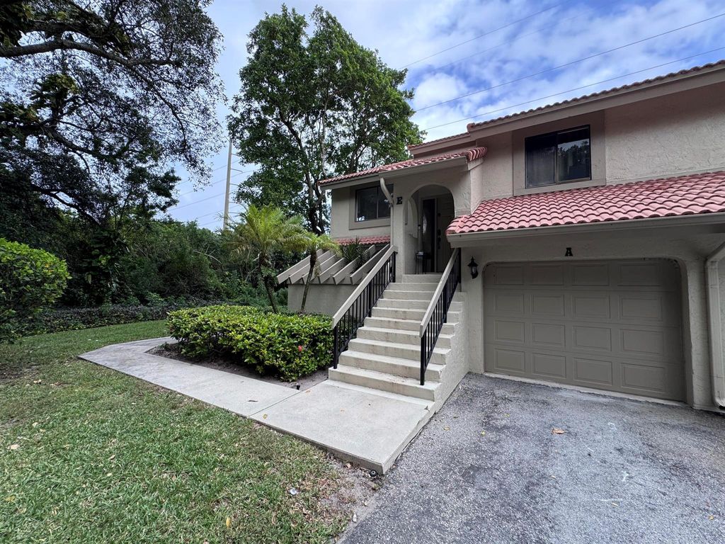 Photo of 5650 Coach House Circle #A, Boca Raton, FL 33486 (MLS # R11032766)
