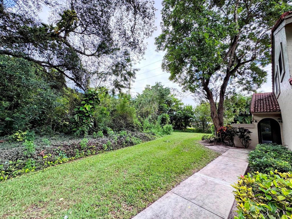 Photo of 5650 Coach House Circle #A, Boca Raton, FL 33486 (MLS # R11032766)