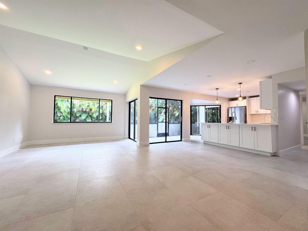 Photo of 5650 Coach House Circle #A, Boca Raton, FL 33486 (MLS # R11032766)