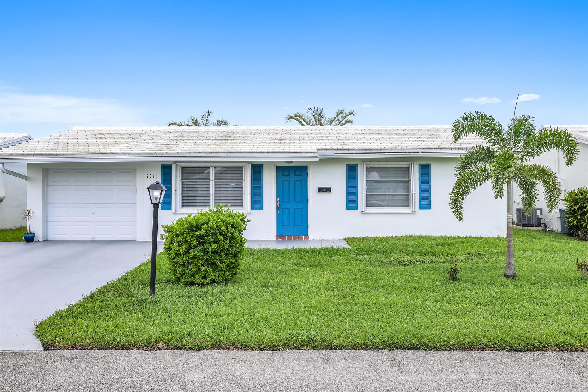This home offers the best of everything that you have been searching for in your piece of paradise. You will love the spacious layout with a bonus area that is ideal for a large formal dining area, an office or sitting area. The kitchen was updated in 2019 with white cabinets, quartz countertops, and all new appliances. There are tile floors in the main living space and new carpeting in the bedrooms. Other features include new impact front door and garage door, A/C 2018, new hot water heater, new gutters, and new accordion shutters. The home offers ample parking with a nice sized driveway. It is being sold fully furnished so you can start enjoying it right away. Your location is ideal in the community with easy access to community amenities.