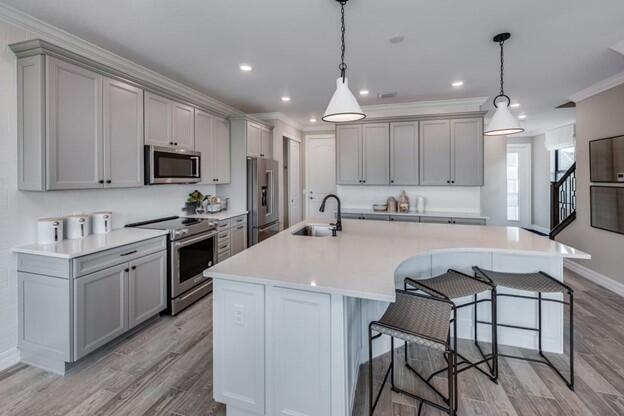 WOW! Stunning waterfront corner townhome located in the highly sought-after community of The Fields in Lake Worth. This luxurious home boasts 3 spacious bedrooms and 2.5 bathrooms, offering ample space for comfortable living. The open layout is perfect for entertaining guests, and the modern kitchen features stainless steel appliances and granite countertops. The living room offers a cozy space with large windows and a water view. Upstairs, the master bedroom includes a walk-in closet and en-suite bathroom with dual sinks and large shower. Enjoy community amenities such as a resort-style pool, clubhouse, and fitness center. The Turnpike and shopping are only 0.5 miles away.