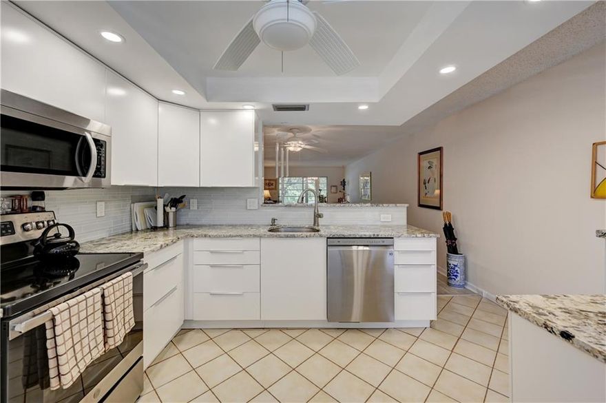 SPECTACULAR 2BEDROOM/2BATH WITH WASHER/DRYER INSIDE APT. THIS CONDO IS IN MINT CONDITION. REDY TO MOVE IN. REMODELED KITCHEN WITH NEWER CBINETS + GRANITE COUNTER TOPS. OPEN KITHCNE CONCEPT. WOOD LIKE FLOORS THROUGH OUT WITH RENOATED BATHROOMS WITH NEWER VANITIES + MIRRORS + TOILETS. FANS IN EVERY ROOMS. ENCLOSED PATIO OVERLOOKING THE BEAUTIFUL LAKE/FOUNTAIN VIEW. COME SEE THIS WONDERFUL CONDO BEFORE IT GETS SOLD!. JALOUSIE WINDOWS IN BALCONY. SQ FT MAY BE HIGHER DUE TO ENCLOSED PATIO. ASSOC REQUIRES 20% DOWN & 1 OCCUP 55+ VACANT/CLICK ON SHOWING ASSIST