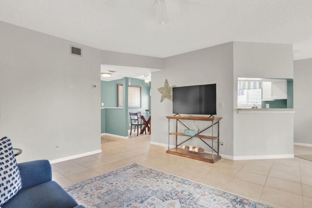 Photo of 6531 Chasewood Drive #D, Jupiter, FL 33458 (MLS # R11158910)