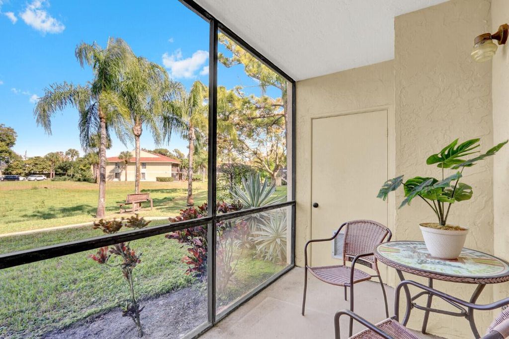 Photo of 6531 Chasewood Drive #D, Jupiter, FL 33458 (MLS # R11158910)