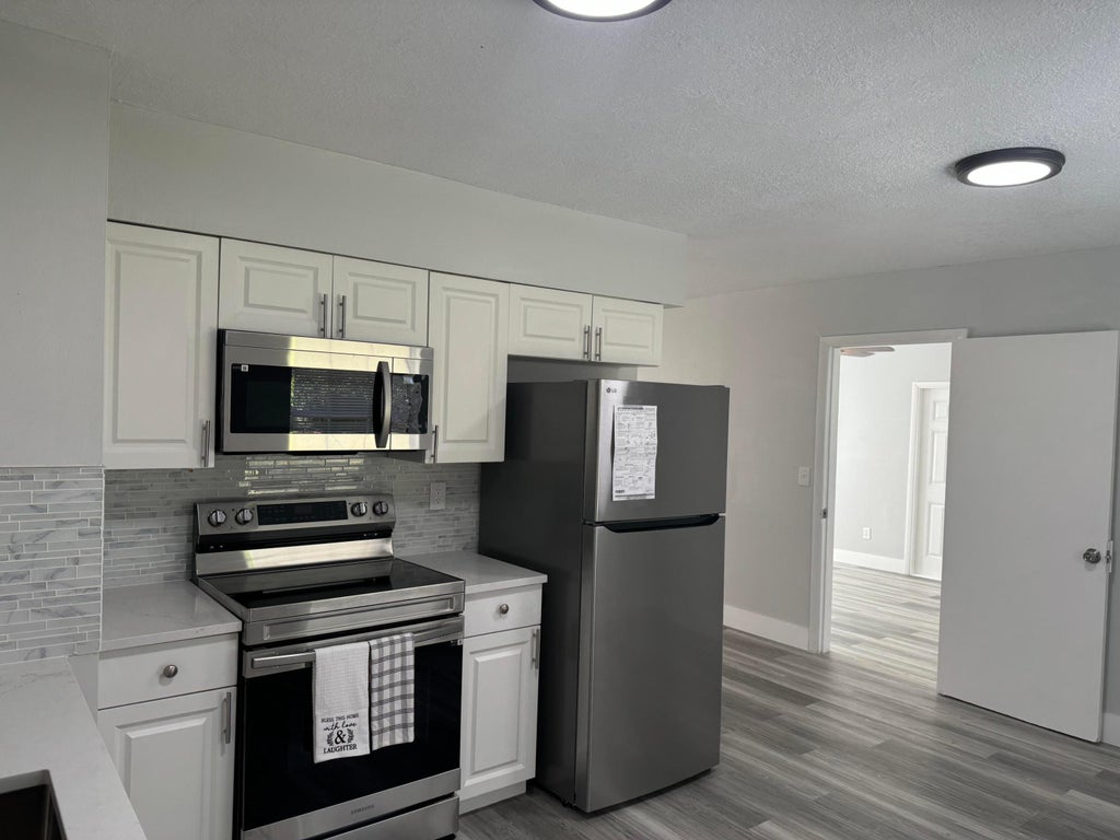 Photo of 4711 Myrtle Drive, Fort Pierce, FL 34982 (MLS # R11011281)