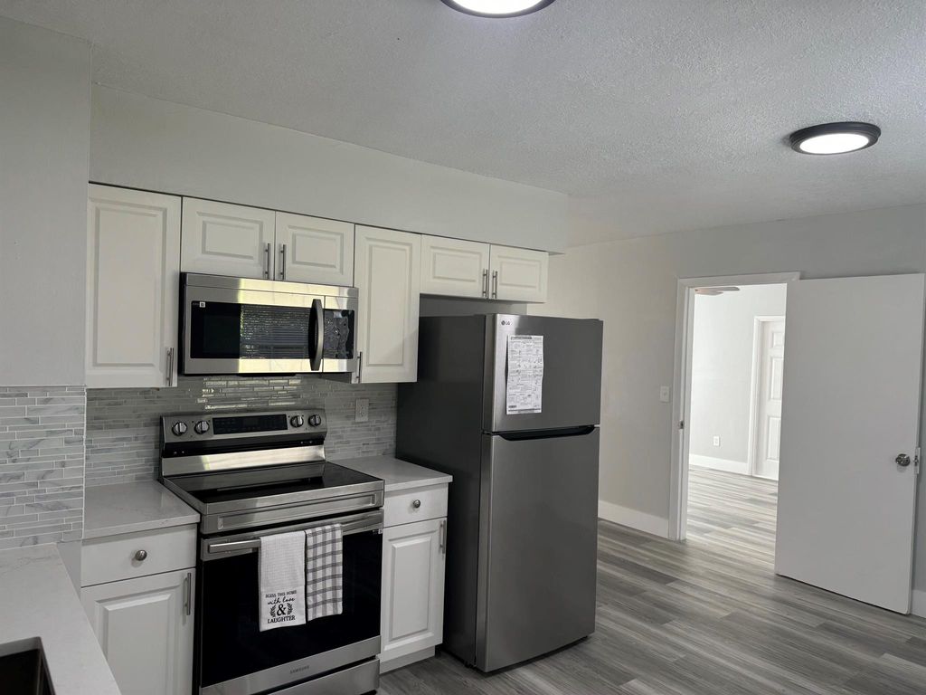 Photo of 4711 Myrtle Drive, Fort Pierce, FL 34982 (MLS # R11011281)