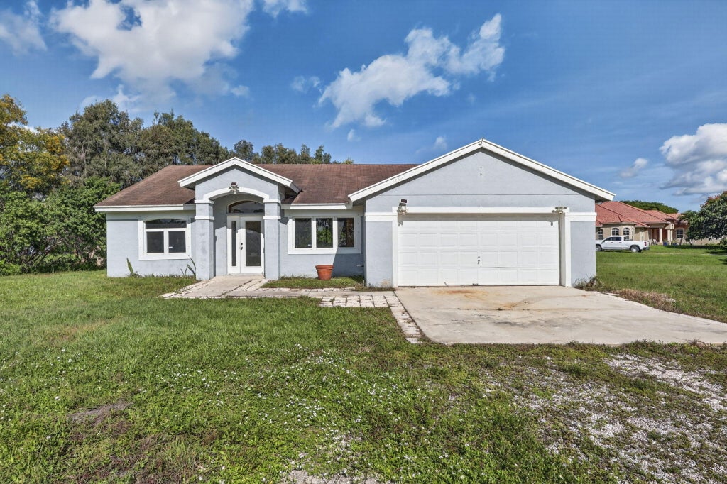 Photo of 18523 40TH Run N, The Acreage, FL 33470 (MLS # B26091098)