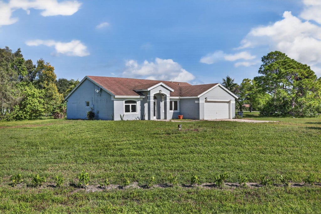 Photo of 18523 40TH Run N, The Acreage, FL 33470 (MLS # B26091098)