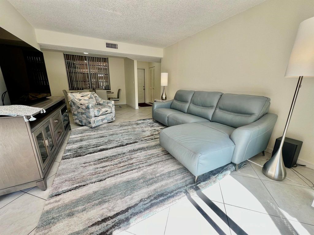 Photo of 3590 Blue Lake Drive #304, Pompano Beach, FL 33064 (MLS # R11146685)