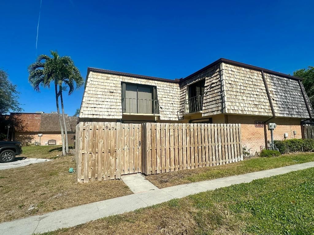 Photo of 97 Lake Arbor Drive, Palm Springs, FL 33461 (MLS # R11150436)