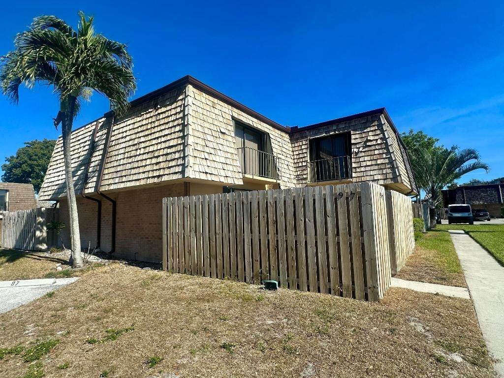 Photo of 97 Lake Arbor Drive, Palm Springs, FL 33461 (MLS # R11150436)