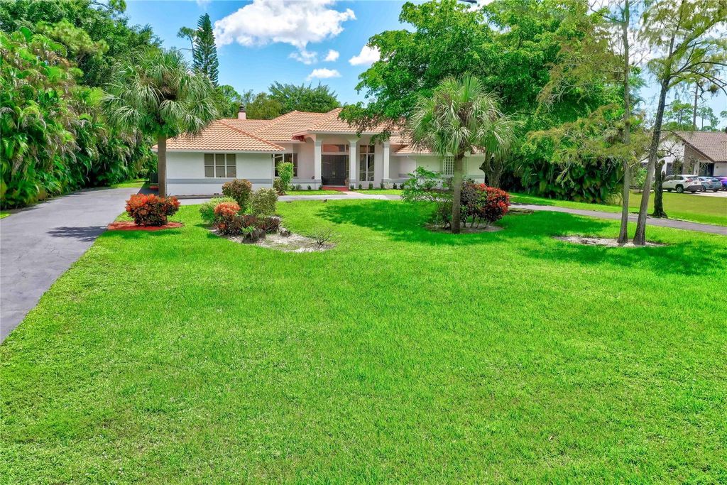 Photo of 6294 NW 65th Ter, Parkland, FL 33067 (MLS # F10398714)