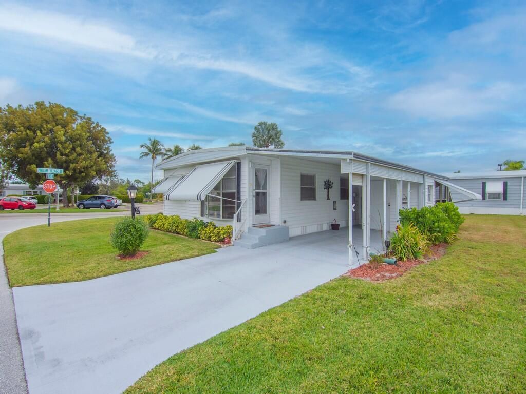 Photo of 258 NE Cameo Way, Jensen Beach, FL 34957 (MLS # R11159791)