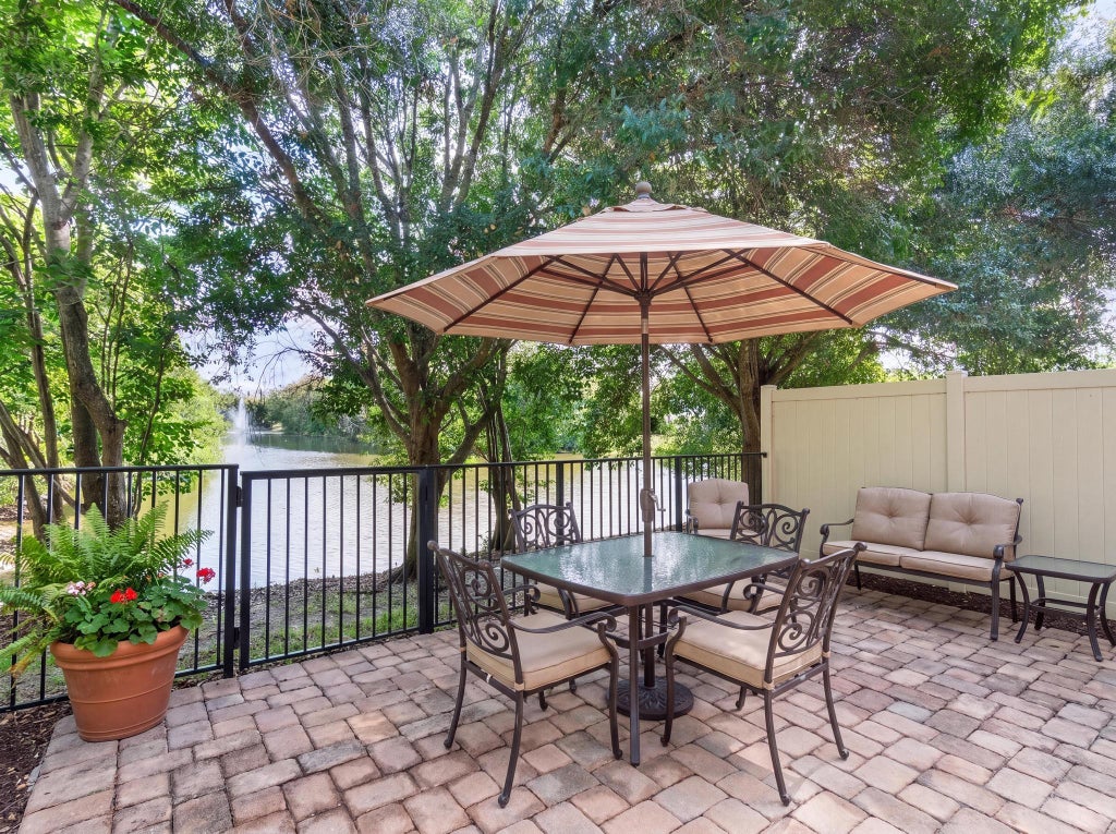 Photo of 301 LAKE MONTEREY Circle, Boynton Beach, FL 33426 (MLS # B26065056)