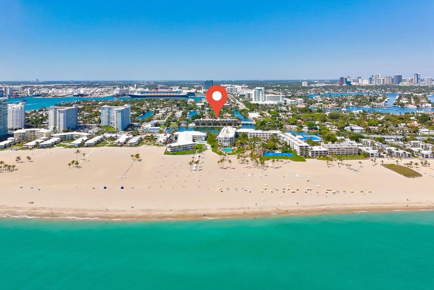 She wants the beach! He wants a boat!  Why compromise? Do both at this stunning, newly-renovated townhome a block from the beach that comes with its own dock slip! Be the first to enjoy this lakeside townhome since its total renovation where EVERYTHING is sparkling new! This beauty was taken down to the studs and newly-reimagined for the discerning buyer with exquisite taste in design and luxury living. The kitchen features gorgeous quartz countertops and backsplash, complemented by shaker-style cabinetry and a Bosch stainless  appliance package . Gorgeous light wood-like porcelain flooring gives the entire townhome that casual, coastal feel.  New A/C, duct work, electrical, painting, the list is endless. Waterfront pool, external storage, and dock for up to 32' boat (2 fixed bridges.)