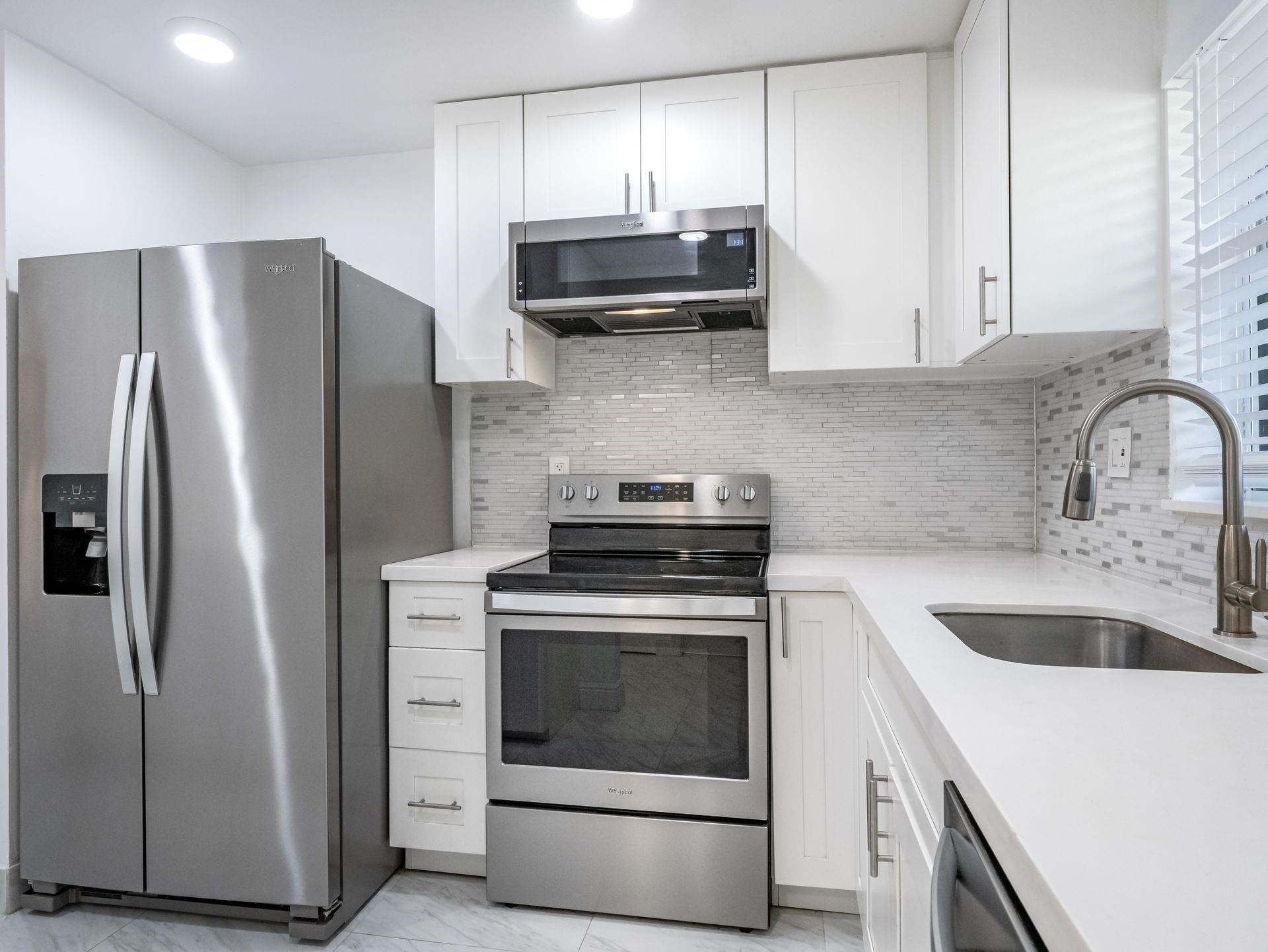 Step into this beautifully updated 1-bedroom, 1.5-bathroom first-floor condo, offering both comfort and convenience in the highly sought-after Phase 4 of Sunrise Lakes. This corner unit provides added privacy and an abundance of natural light, while the breathtaking lake views from the back create a serene retreat. Enjoy a modern, move-in-ready space with stylish finishes throughout. Don’t miss this incredible opportunity to own in one of the most desirable 55+ communities, featuring fantastic amenities and a prime location!