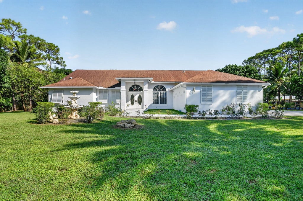 Photo of 8895 Palomino Drive, Lake Worth, FL 33467 (MLS # B26087524)