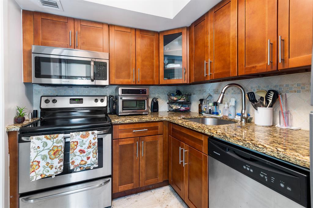 This gorgeous condo that is located in Lauderdale by the Sea is the whole package. The kitchen offers granite counter tops, custom cabinetry and stainless steel appliances. The freshly painted interior gives this unit a very light and bright feel. This home features recessed lighting and spectacular marble flooring throughout. Windows and doors were just replaced with all new HURRICANE IMPACT windows and doors. Assessment was just paid in full that covers a brand new roof, new pavement, painting the exterior of the building and all new railing. You cannot beat this location, being right across the street from the beach! Unit can be rented after two years of owning. Possibilities are endless! Do not miss out on the best priced unit in the building! Schedule your showing today!