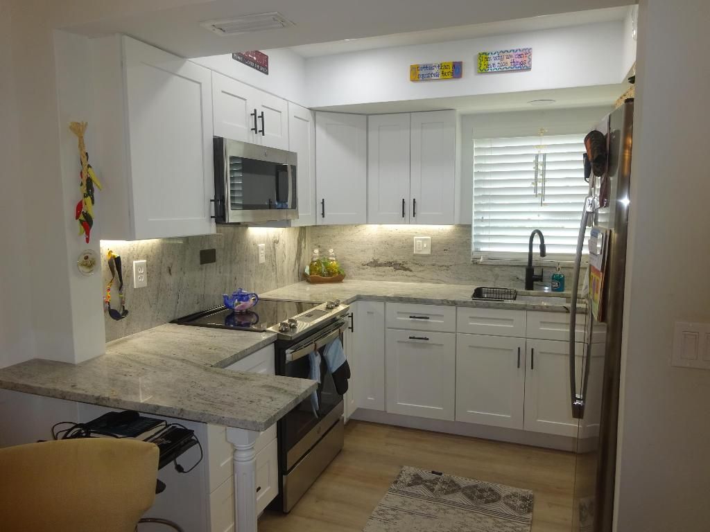 Photo of 2864 Crosley Drive E #A, West Palm Beach, FL 33415 (MLS # R11153969)