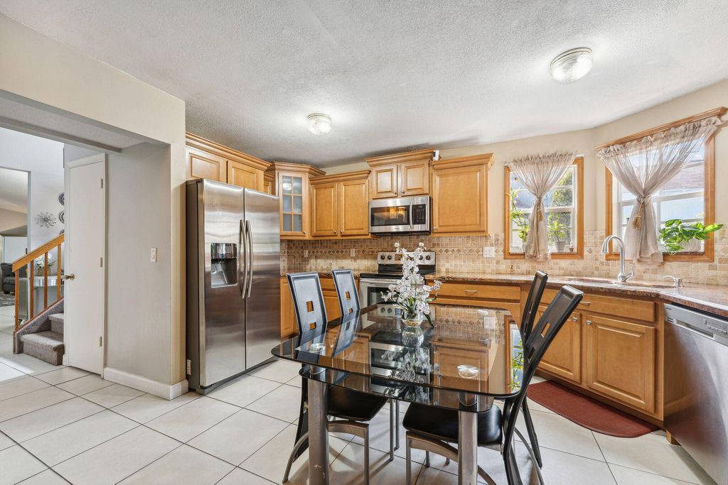 Photo of 1412 Apple Blossom Lane, West Palm Beach, FL 33415 (MLS # R10935528)