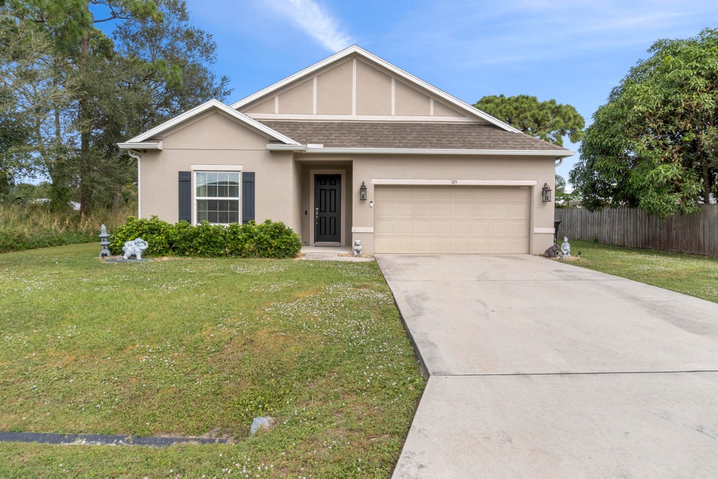 Photo of 109 SW Duval Avenue, Port Saint Lucie, FL 34983 (MLS # R11039248)