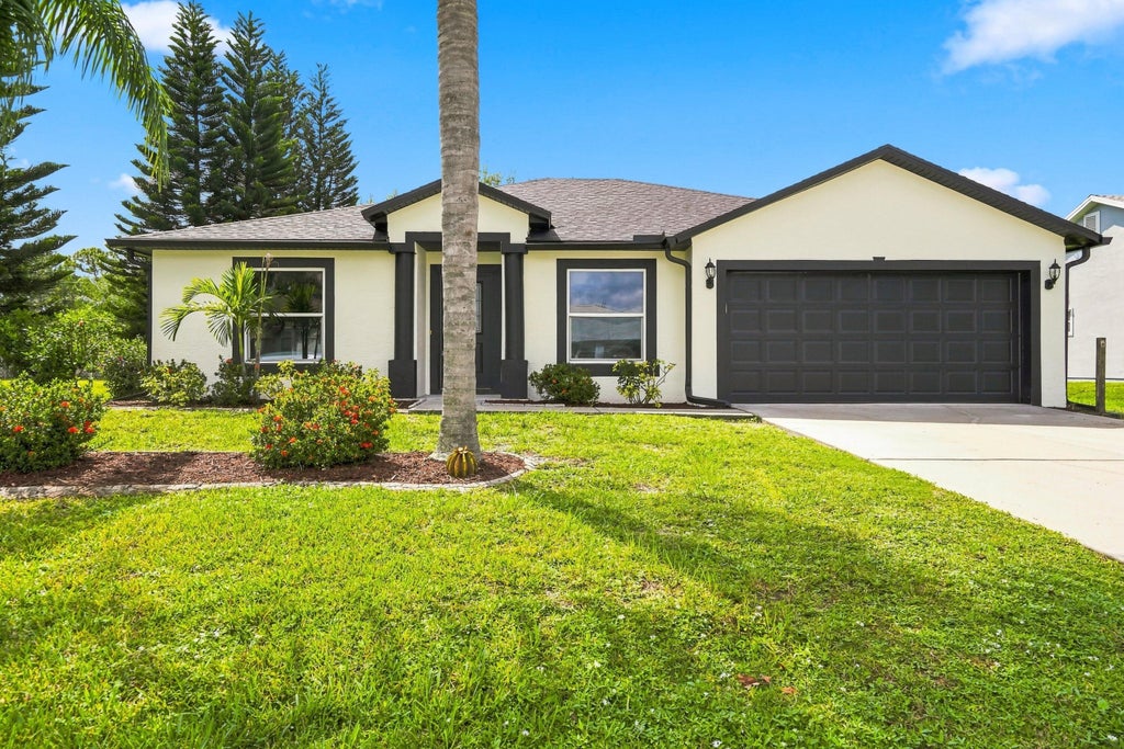 Photo of 820 SW Jennifer Terrace, Port Saint Lucie, FL 34953 (MLS # B26072947)