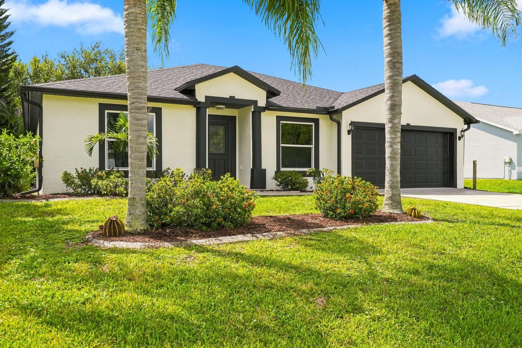 Photo of 820 SW Jennifer Terrace, Port Saint Lucie, FL 34953 (MLS # B26072947)