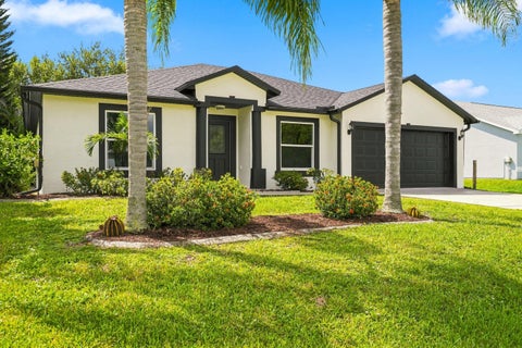 Photo of 820 SW Jennifer Terrace, Port Saint Lucie, FL 34953 (MLS # B26072947)