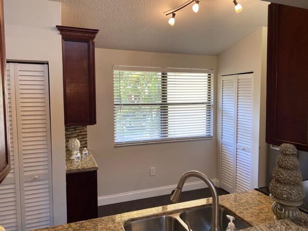 Photo of 134 NW 98th Terrace, Plantation, FL 33324 (MLS # B26021036)